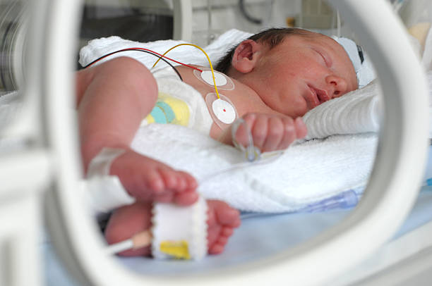 istock Newborn baby in incubator 470920394