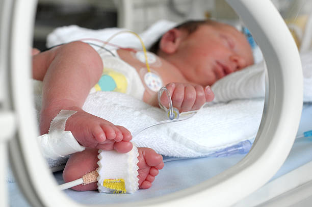istock Newborn baby in incubator 470920398