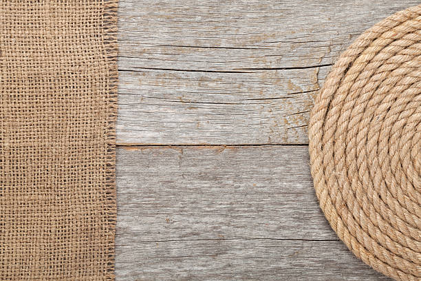 istock Ship rope on wood and burlap 470921965