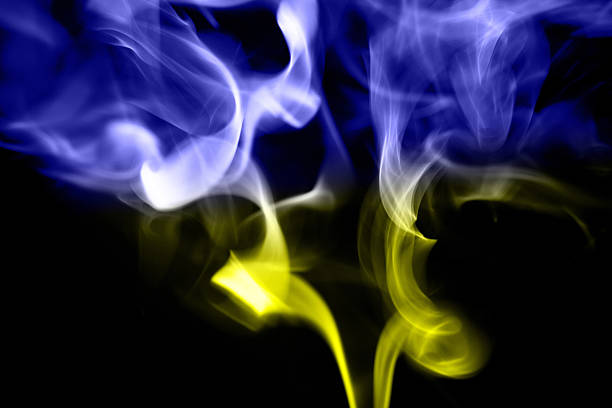 istock colored smoke on a black background with ukrainian flag 470922950