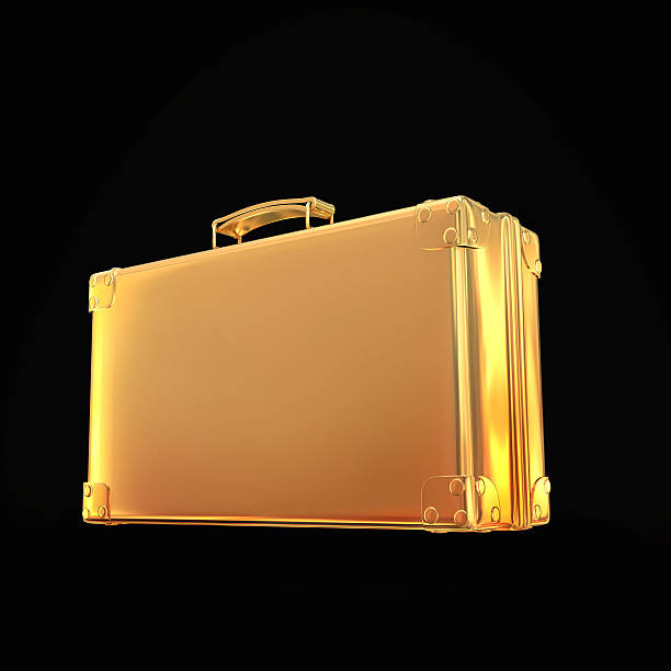 istock Beautiful golden briefcase representing  business on black background 470924066