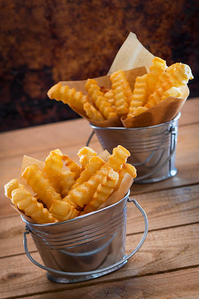 istock French Fries in silver decorative containers 470924086