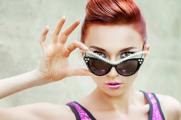 istock woman wears luxury sunglasses 470927170