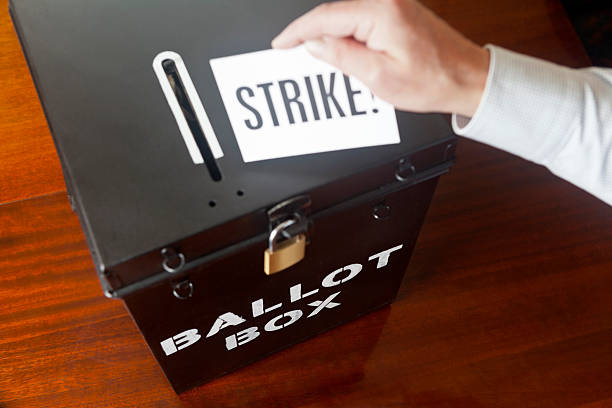 Voting to Strike Ballot Box voting to take industrial action for workers to go out on strike. strike protest action stock pictures, royalty-free photos & images