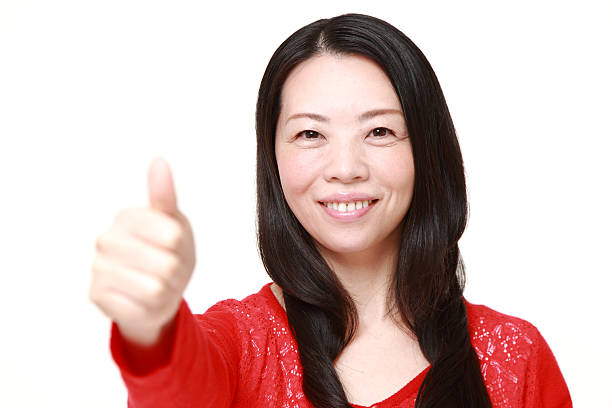 istock Japanese woman with thumbs up gesture 470931820
