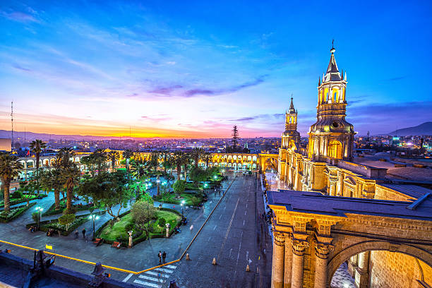 Arequipa Plaza at Night Night falling on the Plaza de Armas in the historic center of Arequipa, Peru arequipa province stock pictures, royalty-free photos & images