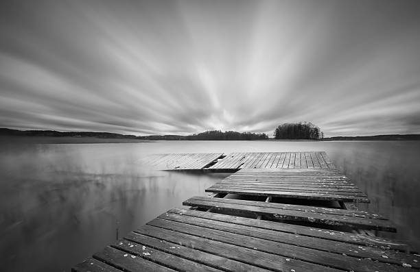 istock Lake with jetty. long exposure landscape. 470932696