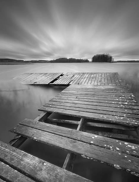 istock Lake with jetty. long exposure landscape. 470932726