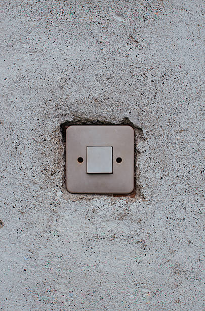 istock The old white switch on the dirty white wall 470933338