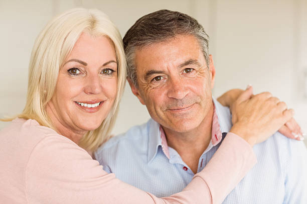 istock Happy mature couple smiling together 470933724