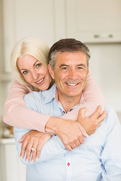 istock Happy mature couple smiling together 470933746