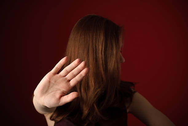 Young redhead girl Woman with hand signaling to stop single word no stock pictures, royalty-free photos & images