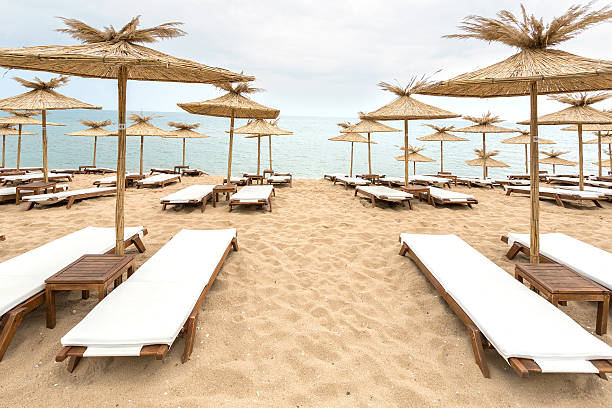 istock Straw umbrellas on sunny beach in Bulgaria 470934296