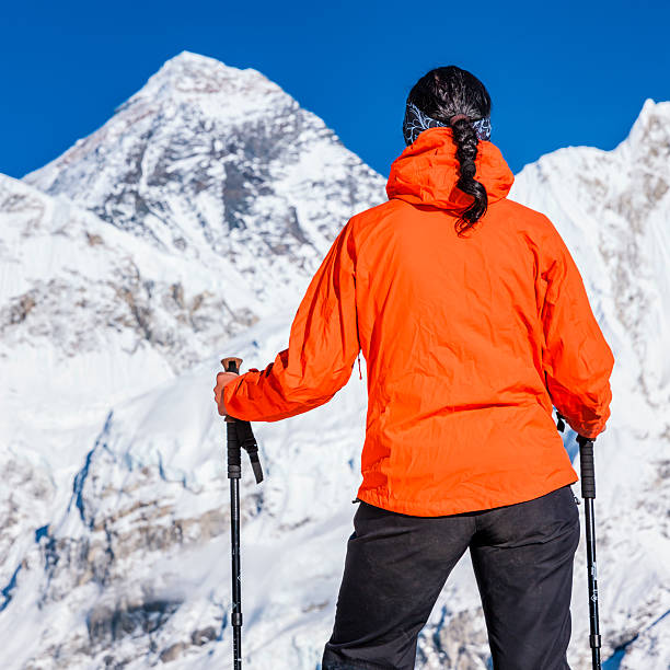 istock Female trekker looking at Mount Everest, Himalayas, Nepal 470934923