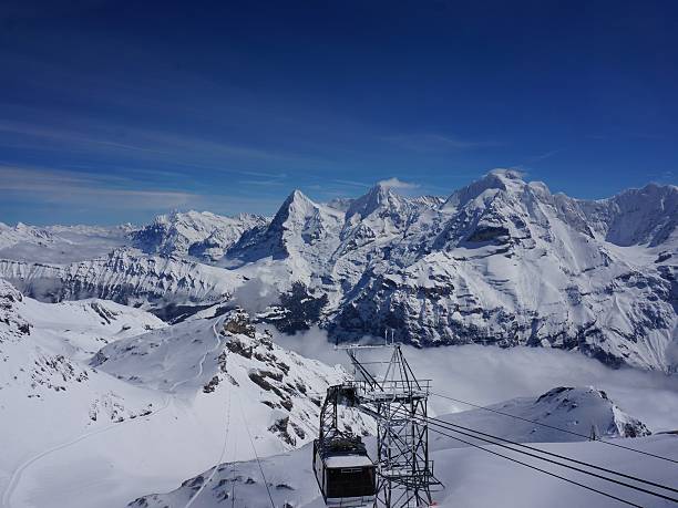 istock Swiss alps and cable car 470938312
