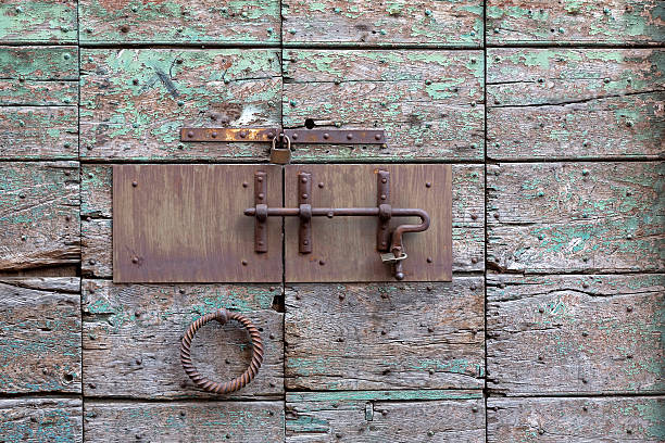 istock Locked wooden weathered door 470938530