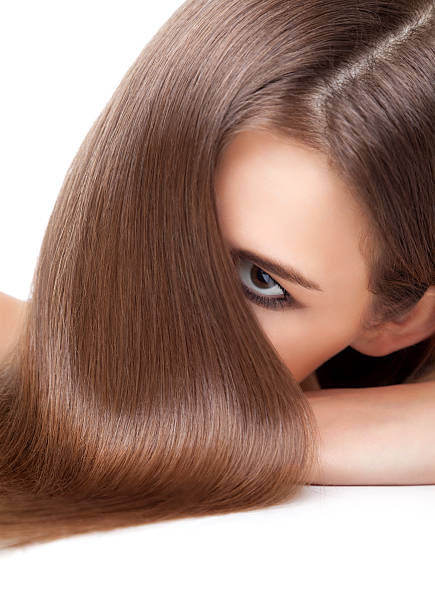 istock Beautiful brunette with long straight and shiny hair 470938596