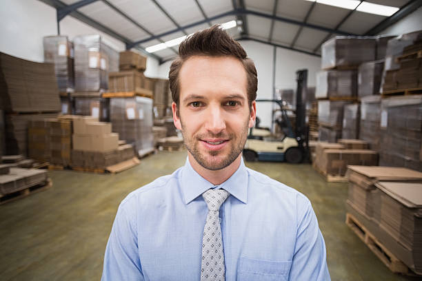 istock Smiling male manager in warehouse 470942358