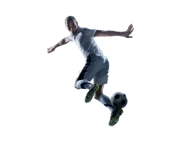 istock Soccer player kicking ball 470943784