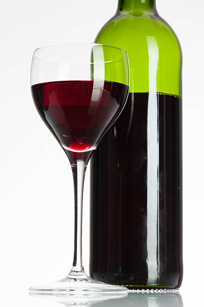 istock Glass and bottle with red wine 470947454