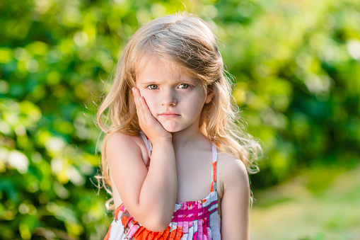Headshot portrait of little girl posing