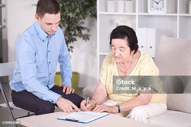 Senior Women With Pension Consultant Stock Photo - Download Image Now - 30-39 Years, 70-79 Years, Active Seniors