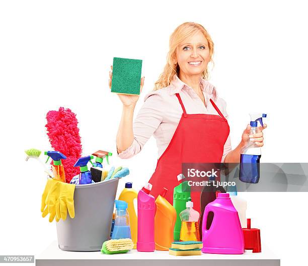 Mature Female Cleaner Posing With Cleaning Equipment Stock Photo - Download Image Now
