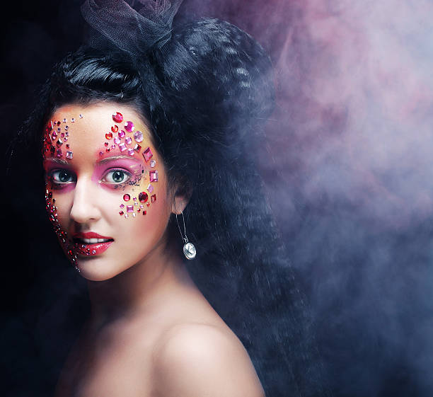 istock woman with bright artistic make-up 470955476