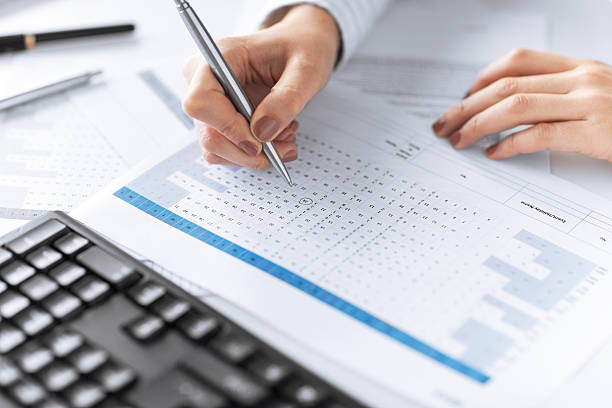 istock Businessman hands pointing at business document 470958218