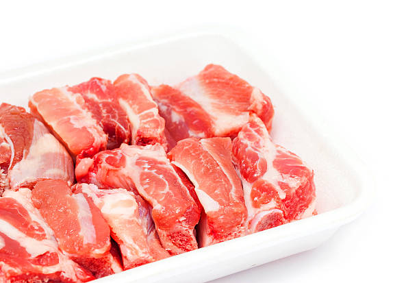 istock pork spareribs raw in tray foam isolated on white background 470962582