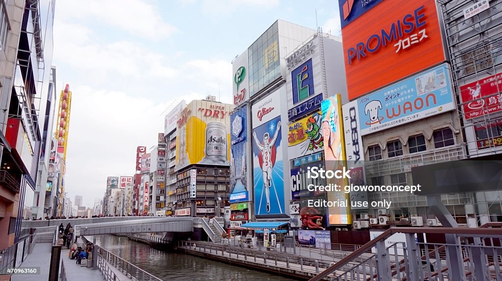 osaka glico landmark Osaka, Japan - March 2, 2015: Glico landmark sign area at Dotonburi shopping street 2015 Stock Photo