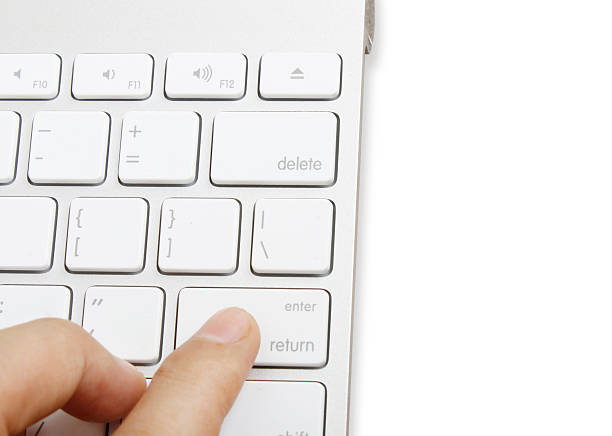 istock Fingers to keyboard buy now 470965291