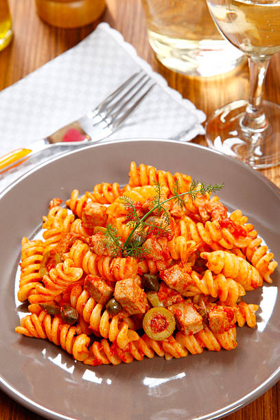 istock Pasta with tuna, olives and capers 470966457