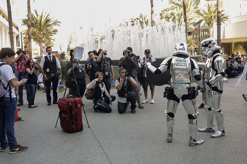 Anaheim, CA, USA - April 16, 2015: Crowd of People With Cameras Taking Pictures of Silver Storm Troopers at the 2015 Star Wars