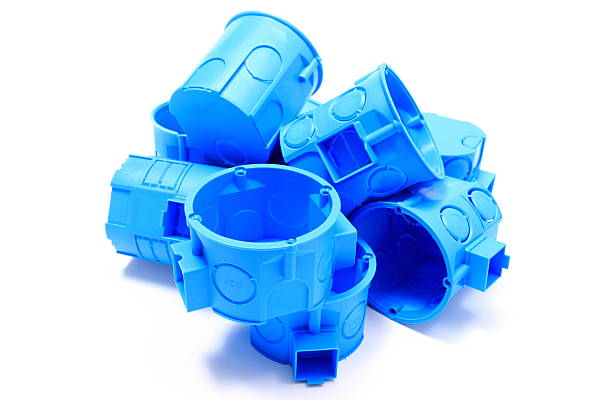 istock Heap of blue electrical boxes on white background 470967632