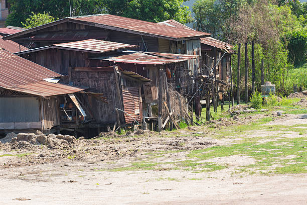 istock vintage wooden house with rusty roof 470967682
