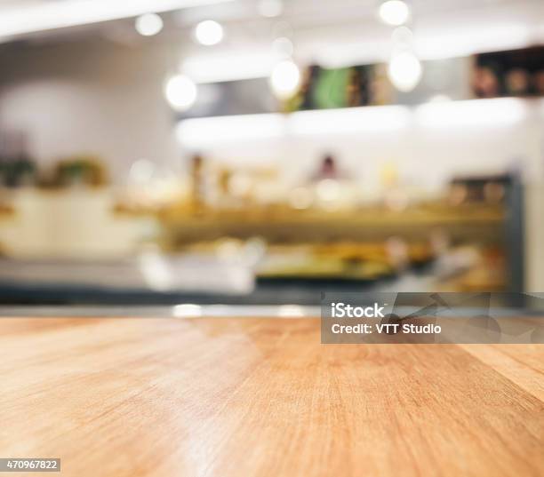 Table Top With Blurred Kitchen Interior Background Stock Photo - Download Image Now - Table, Kitchen, Restaurant