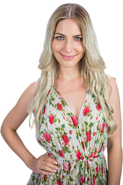 istock Happy blonde wearing flowered dress posing 470971432