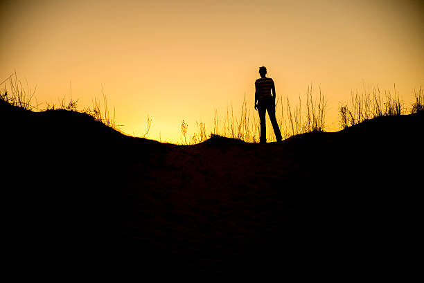 Woman at Sunset stock photo