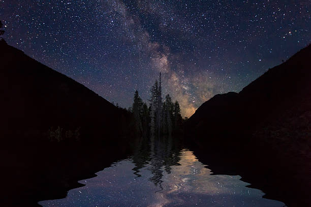 istock Amazing night landscape with mountains and stars. 470976220