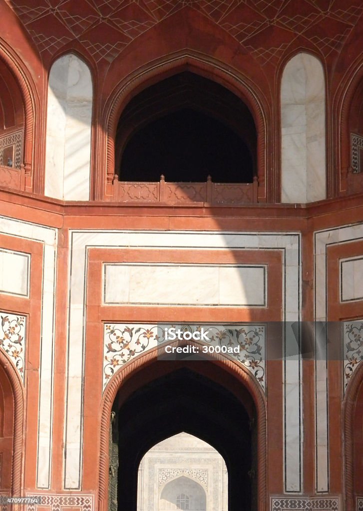 Taj Mahal main gate architectural details Decorated main gate portal to the Taj Mahal site in Agra, India, with floral marble inserts 2015 Stock Photo