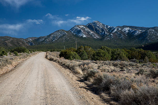 Dirt Road to Mountains stock photo