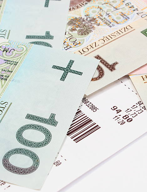 istock Closeup of money with receipt on white background 470978984