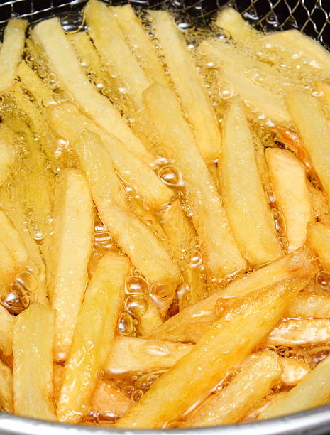 istock French fries fried in oil 470978998