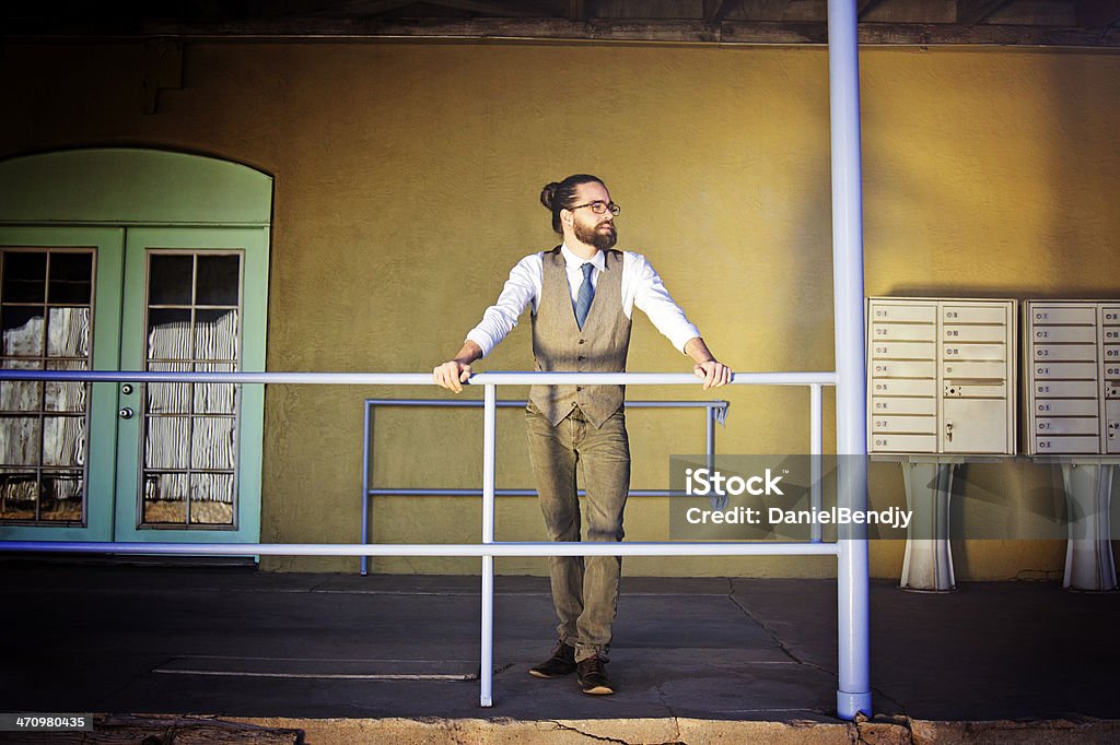 Bearded Man Standing In Front of His Business A bearded man standing in front of his business. Adult Stock Photo