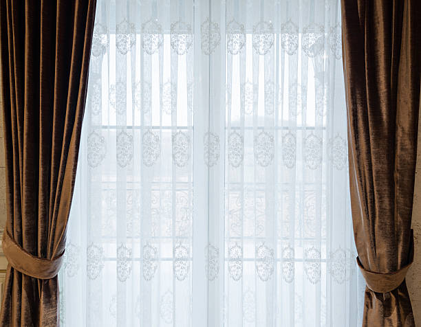 istock Luxurious white and brown curtains at home 470982400
