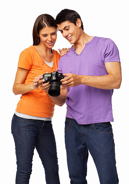 커플입니다 루킹 사진을 디지털 카메라-격리됨에 - purple orange heterosexual couple young men 뉴스 사진 이미지