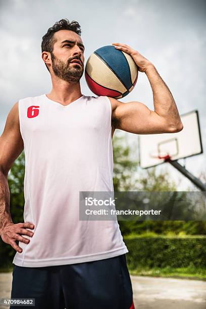 Basketball Player Portrait On The Court Stock Photo - Download Image Now - 20-29 Years, 2015, 30-39 Years