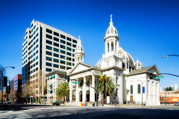 San Jose California Saint Joseph Cathedral San Jose California Saint Joseph Cathedral as viewed from the corner of Market and San Fernando. This 200 year old catholic church is one of the landmarks of Silicon Valley. saint joseph stock pictures, royalty-free photos & images