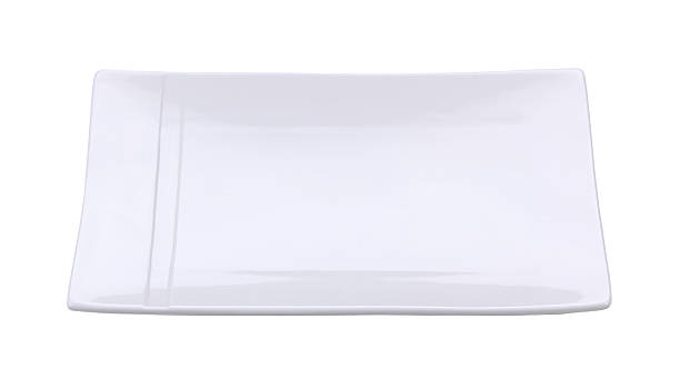 istock White empty plate isolated on white background. Clipping path included 470985358